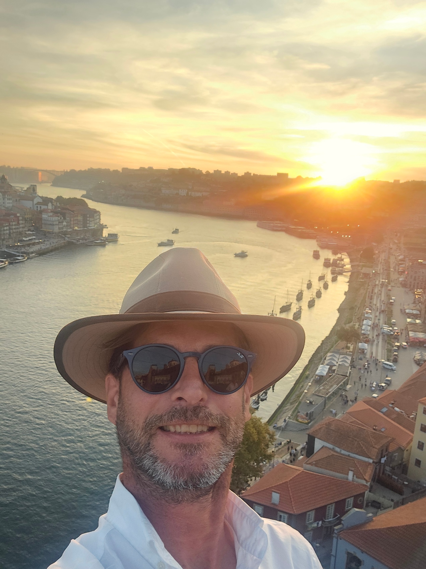 Eduardo, private driver and guide, above the Douro river in Porto at sunset