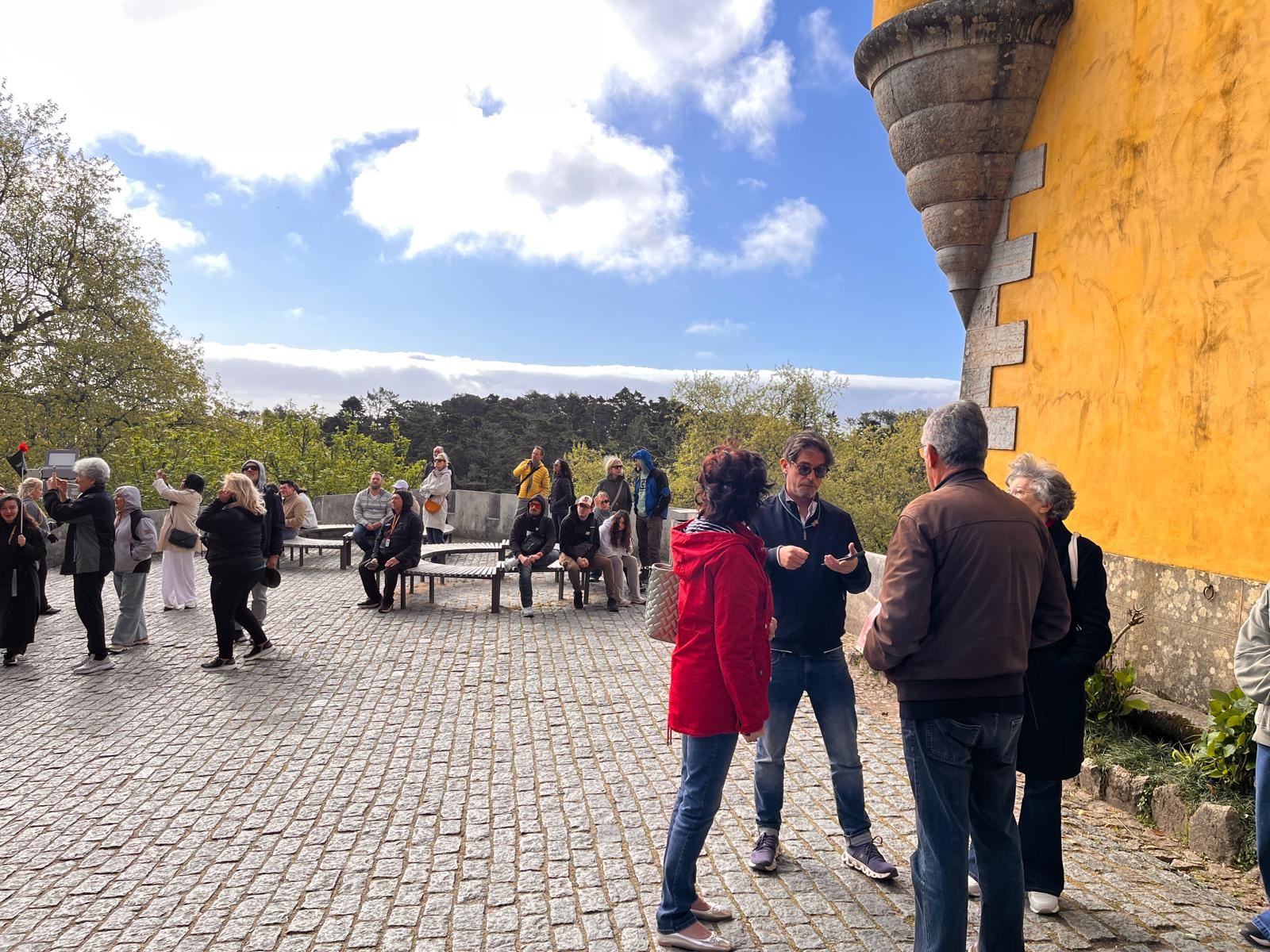 Eduardo guiding guests on the terrace at Pena Palace