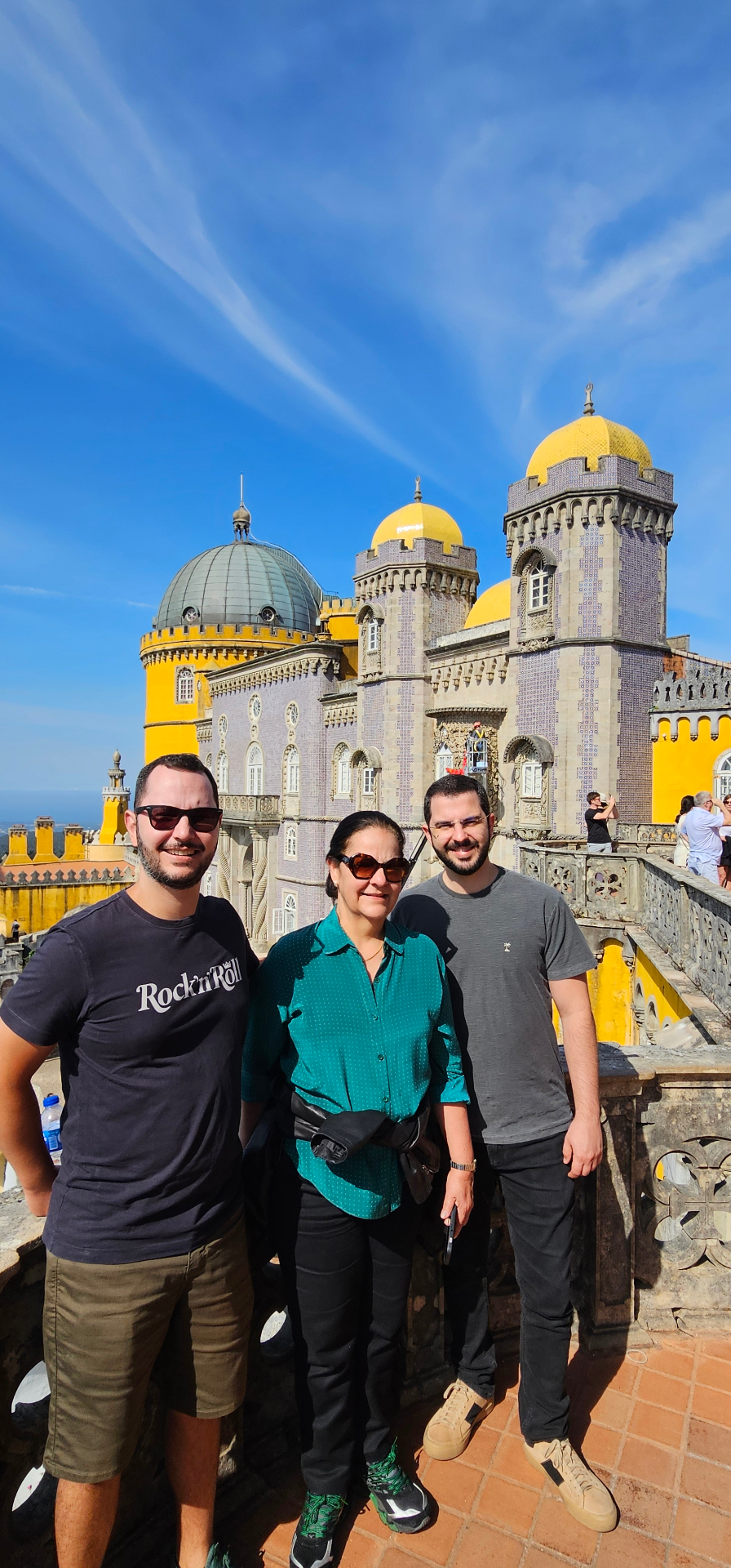 Family in front of the domes of Pena Palace